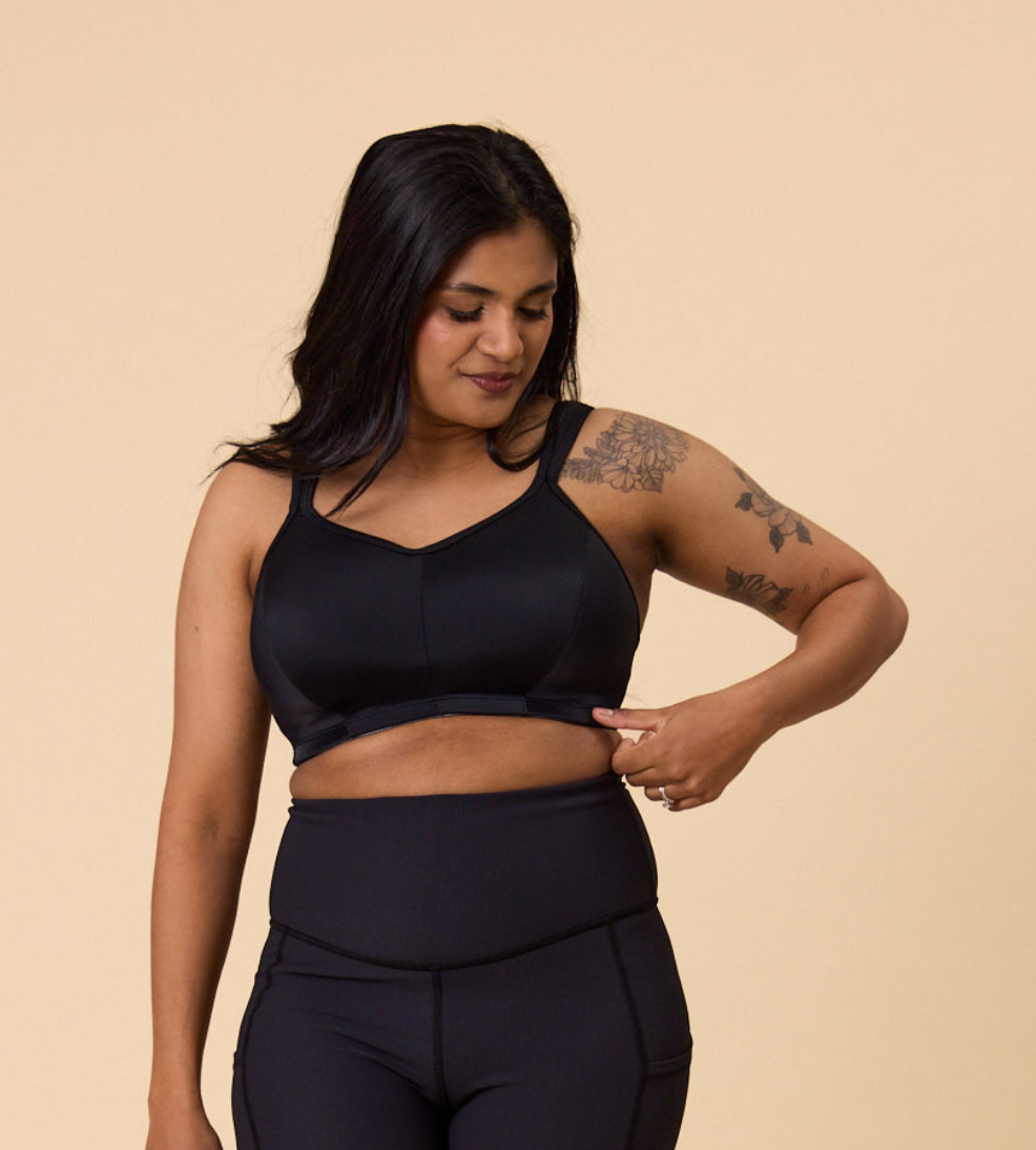 larger busted woman wears a wireless sports bra featuring moulded cups for maximum support