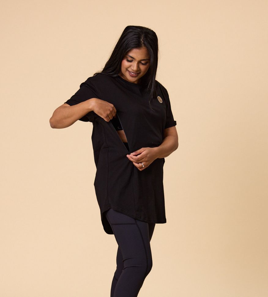 Active mother wearing comfortable and flattering black nursing tee