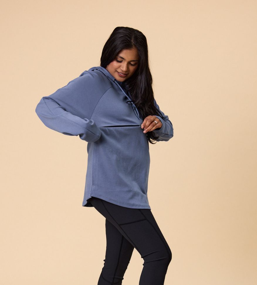 Back view of maternity sweater showing contrast print trim on the hood matching our Evolve Bra