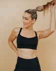 Active Mum wearing black high impact maternity activewear bra