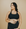 Front view active mum wearing black breastfeeding bra