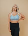 happy pregnant woman wearing her a supportive nursing bra