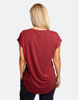 back view of active mum wearing a relaxed fit ruby tee with wide armholes for breastfeeding