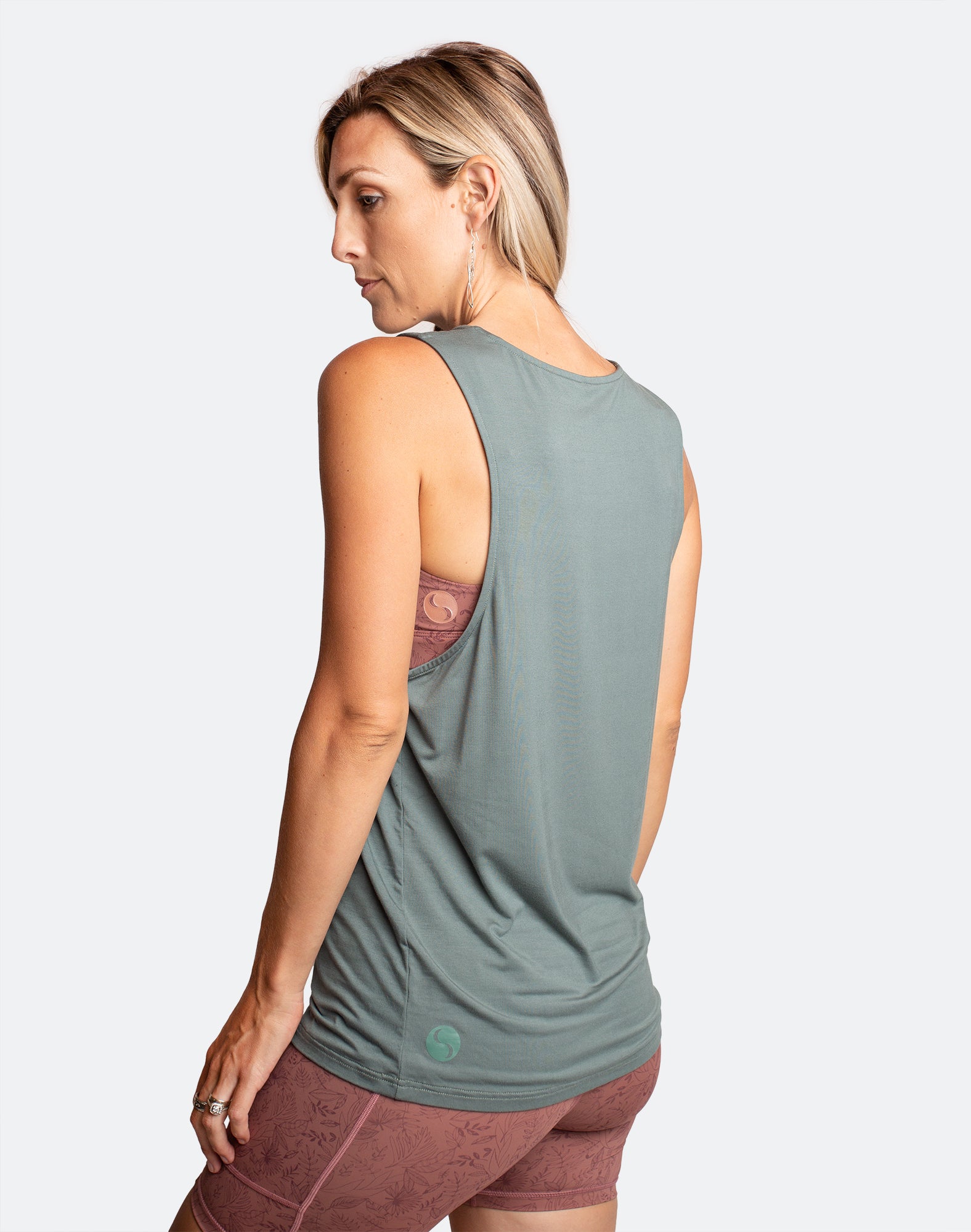 Active mother wearing stylish summer nursing top