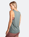 Active mother wearing stylish summer nursing top