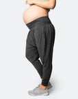 pregnant woman in grey harem maternity pants