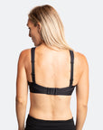 Back view of black pumping sports bra