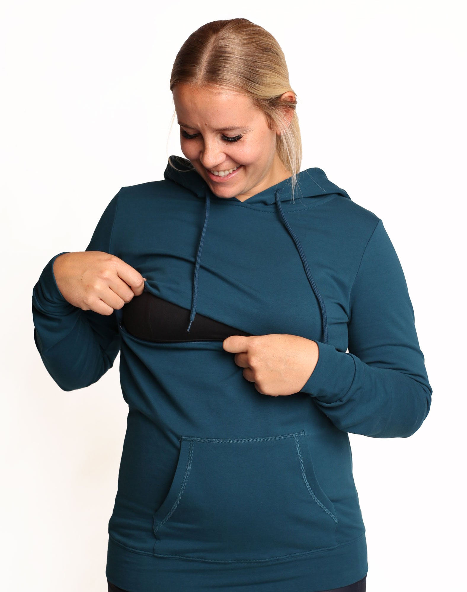 Pregnant mother showing the nursing function of a nursing hooded sweatshirt