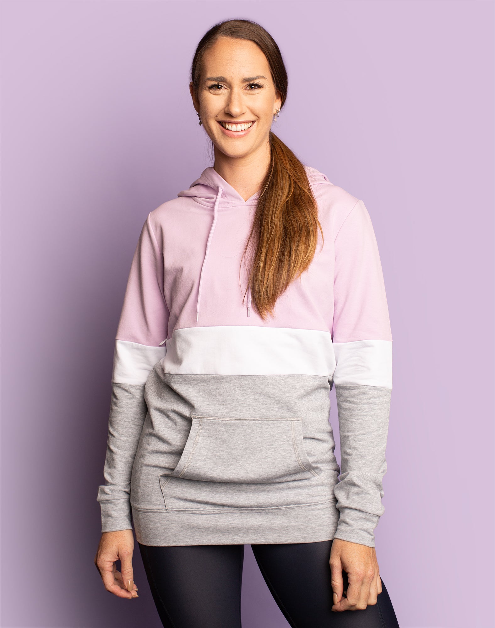 Active mother wearing a three coloured maternity sweatshirt