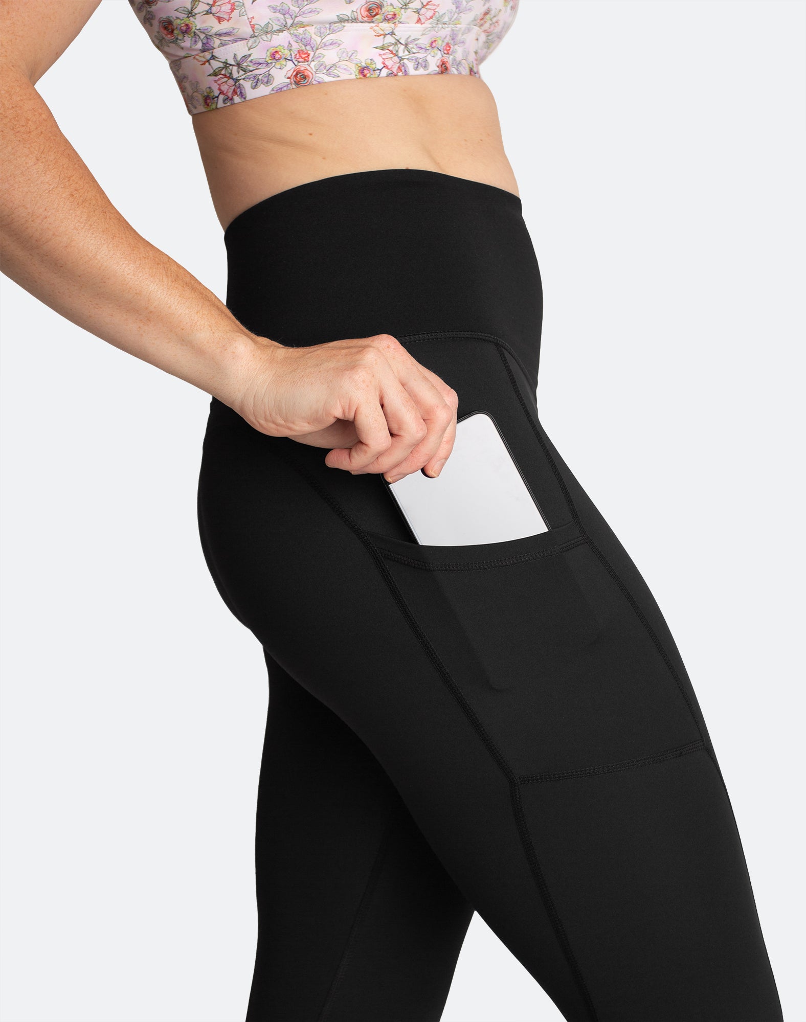 Pocket functionality for phone of postpartum compression pants.