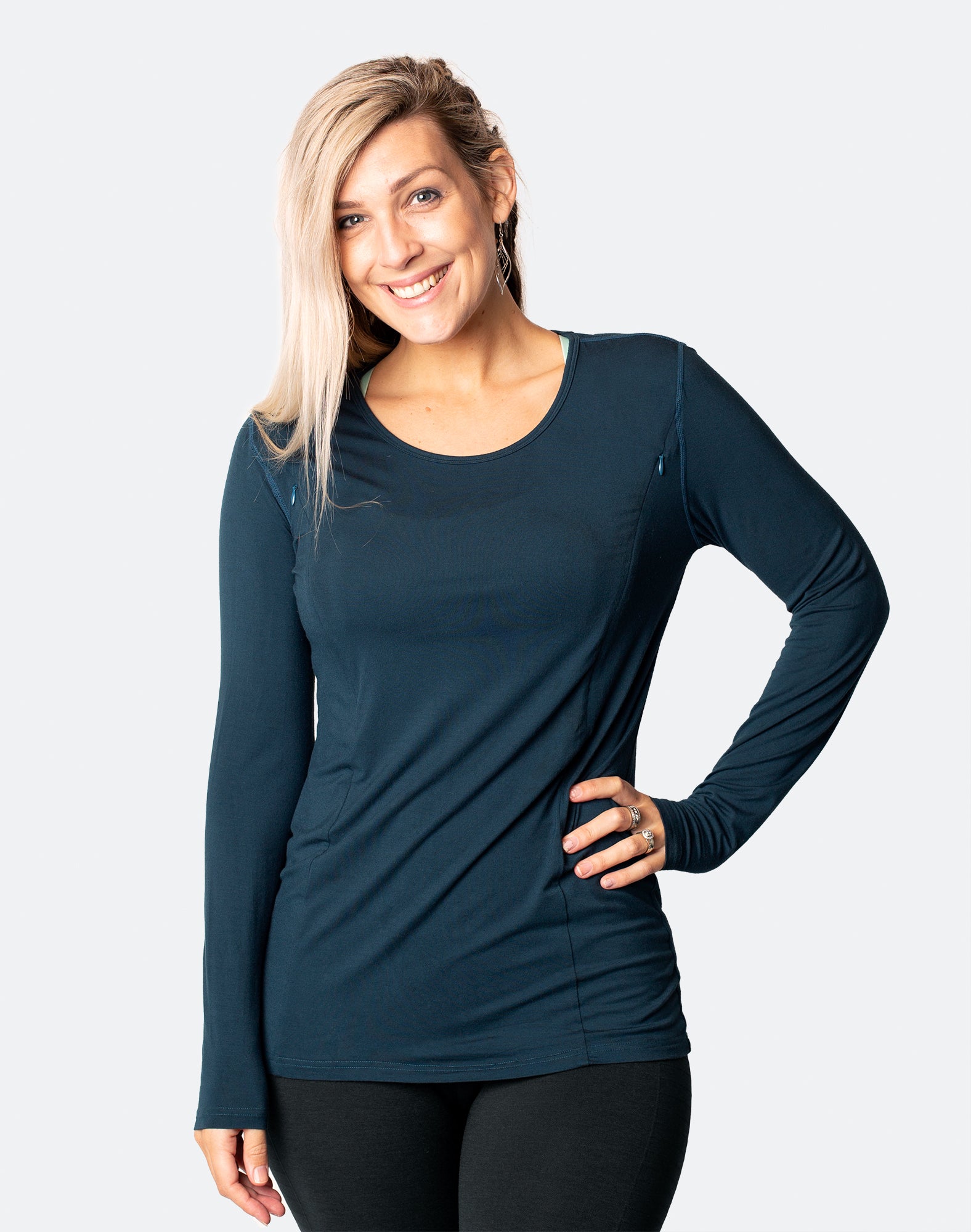 happy, fit mother wearing long sleeve bamboo maternity top