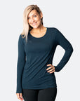 happy, fit mother wearing long sleeve bamboo maternity top