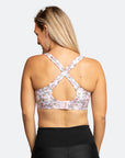 side view of fit, active mum wearing cadenshae crossover back nursing bra