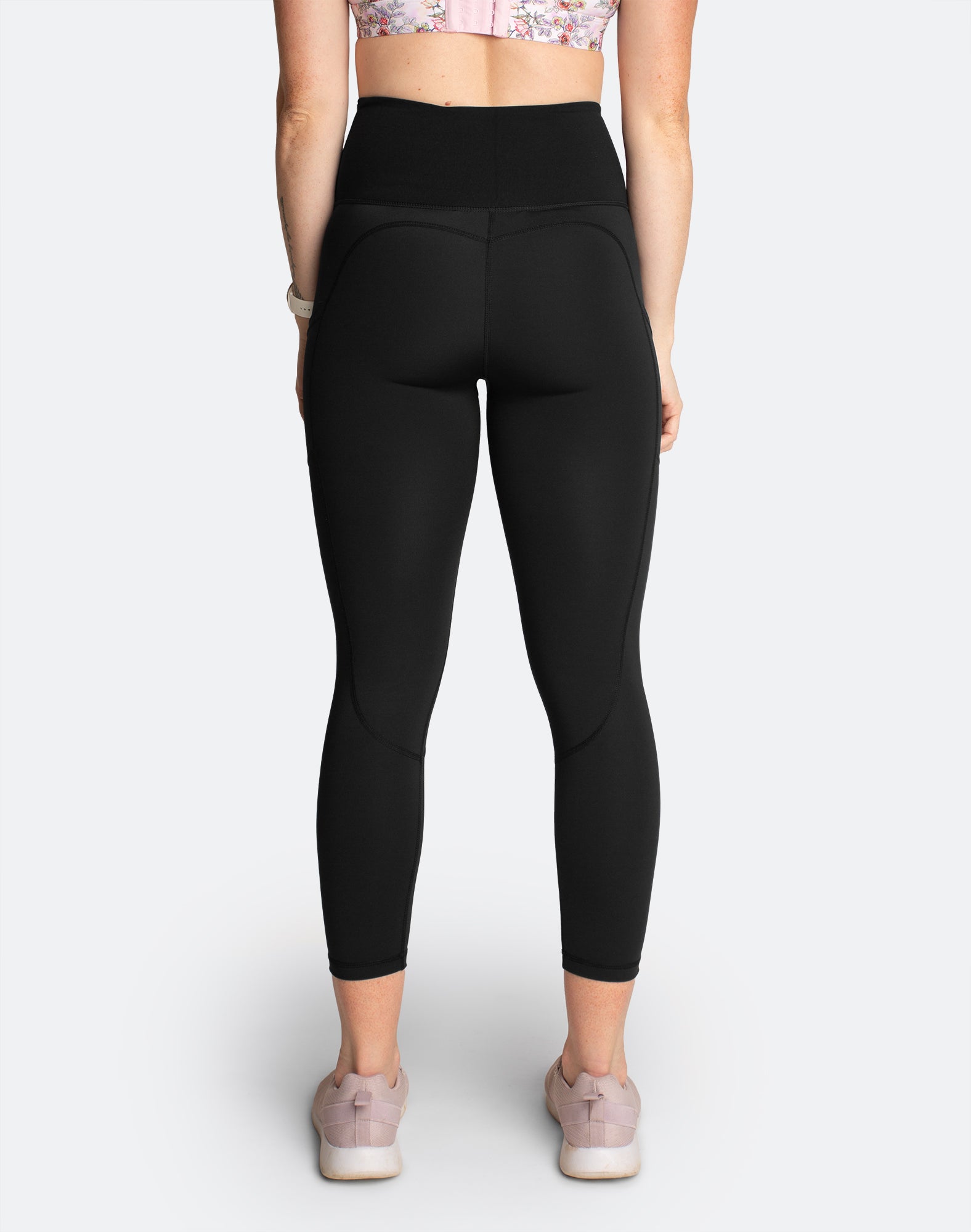 Back view of black high waisted, postpartum compression leggings