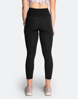 Back view of black high waisted, postpartum compression leggings