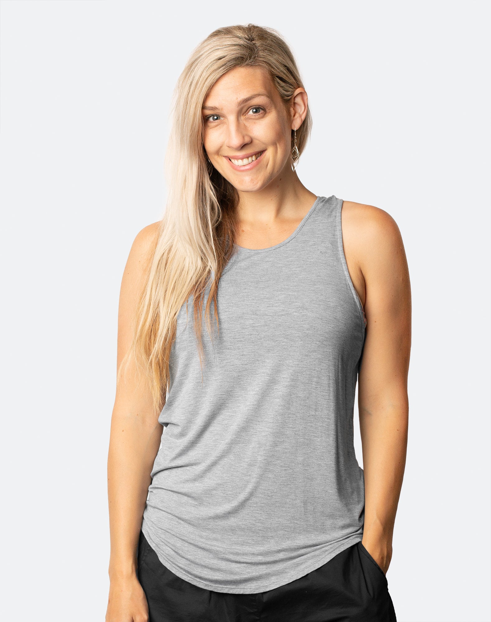 active mum wearing nursing workout top in grey