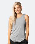 active mum wearing nursing workout top in grey