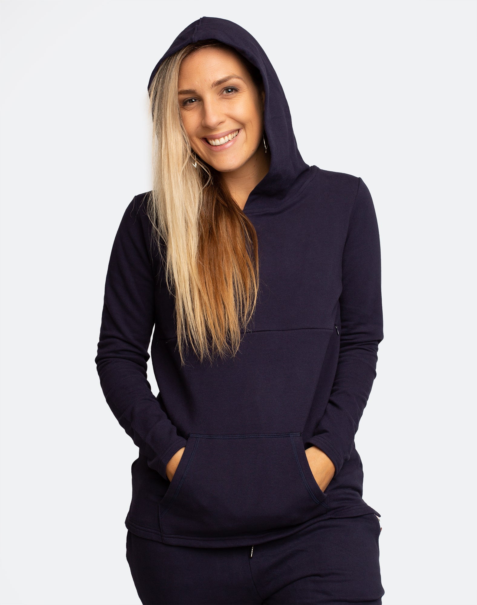 Fit, happy mum wearing maternity nursing hoodie