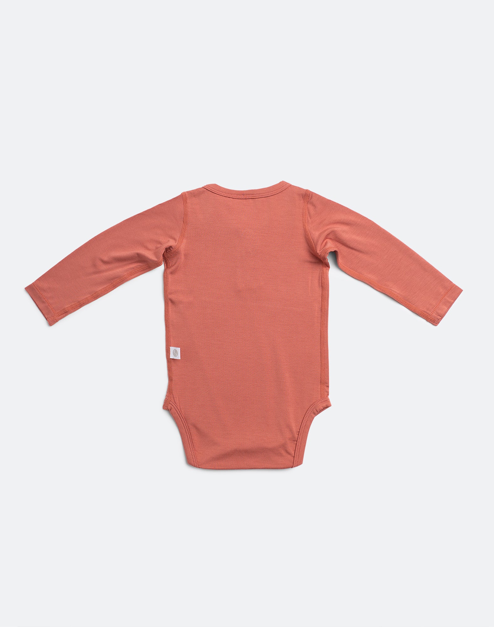 Back view of bamboo rust orange neutral baby bodysuit