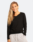 Happy mother wearing black nursing long sleeve top