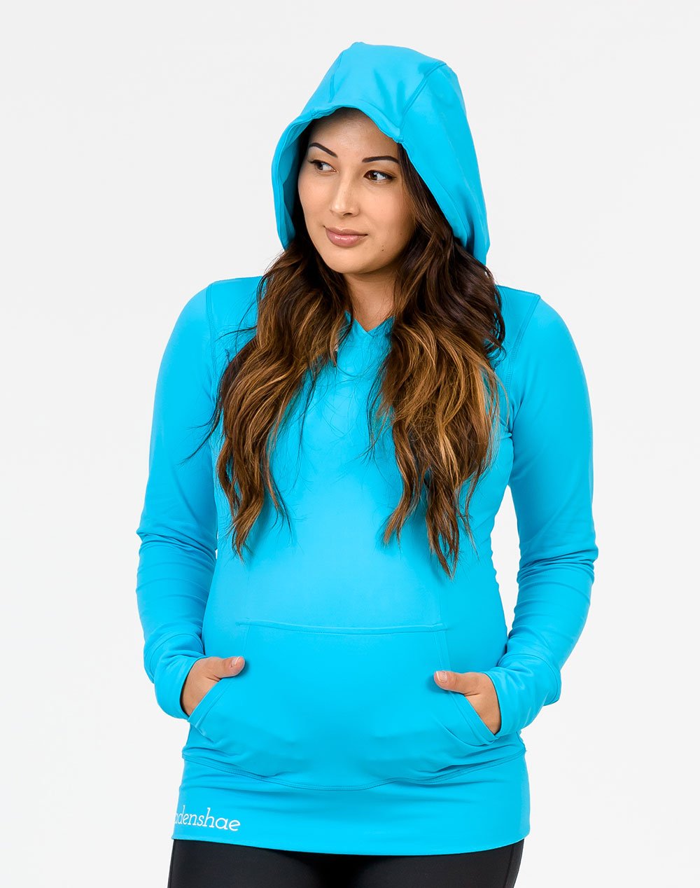 front view of a pregnant mum wearing a sky blue activewear breastfeeding hoodie