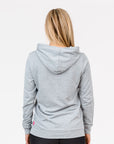 back view of a mum in a grey casual breastfeeding hoodie