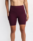 Burgundy postpartum bike shorts with pockets