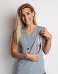 Model showing the nursing zip function on maternity top