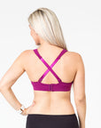 plum playtime bra front view with mum unclipping one dropdown cup to breastfeed