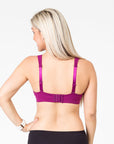 pregnant mum wearing a plum playtime bra back view with option to wear as a normal bra