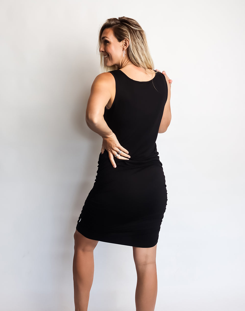 Back view of model wearing maternity & nursing tank dress