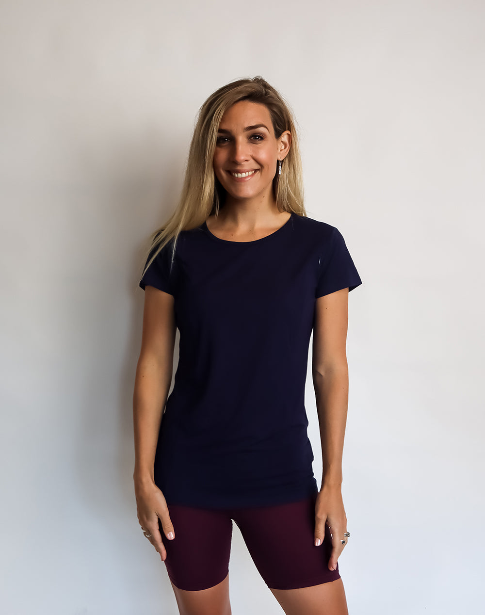 Active mother wearing bamboo nursing t-shirt in blue