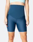 front view of non pregnant woman wearing high waisted bike shorts