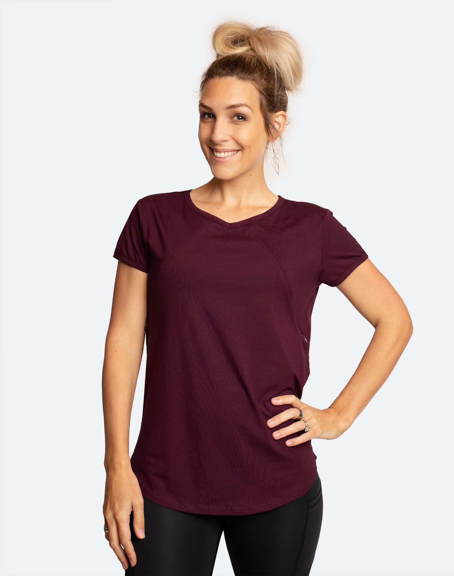 active mum wearing scoop tee fig demonstrating the nursing function