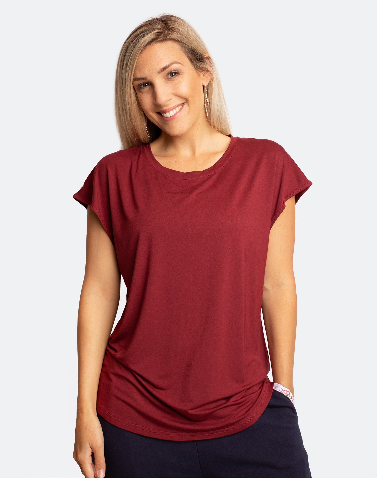 active happy mum wearing a relaxed fit ruby tee with wide armholes for breastfeeding