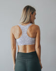 Back view of floral racerback breastfeeding sports bra